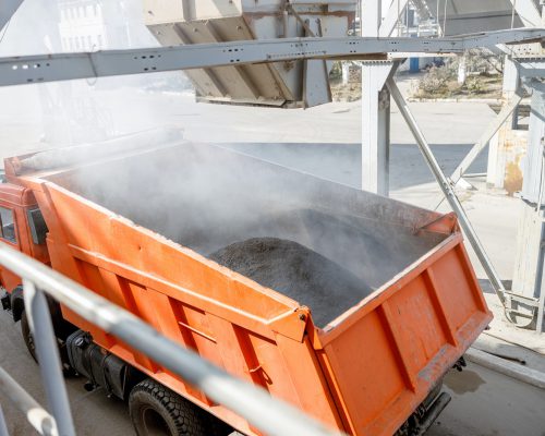 Truck loaded with building material in plant Truck loaded with building material in plant